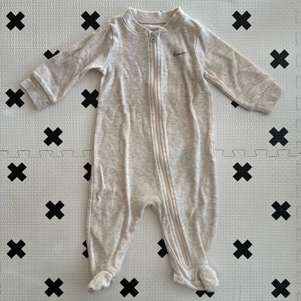 Nike 0-6m cream onesie